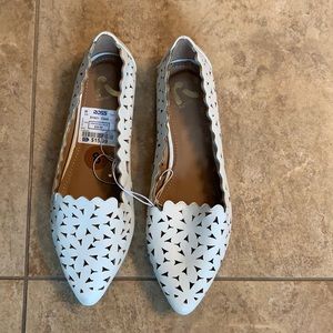 Brand new with tag white flats. Size 8